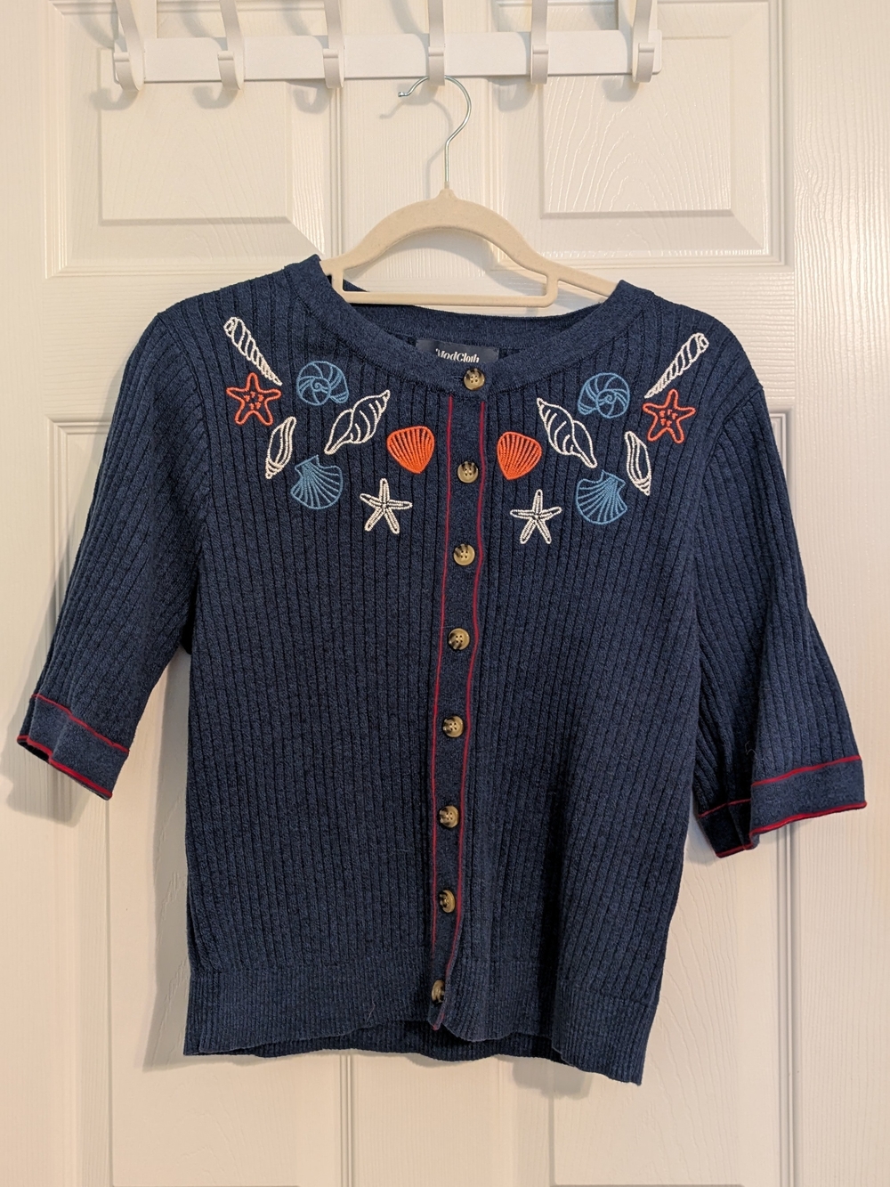 ModCloth Navy Short-Sleeve Knit Cardigan with Orange Shell Embroidery - Picture 1 of 5